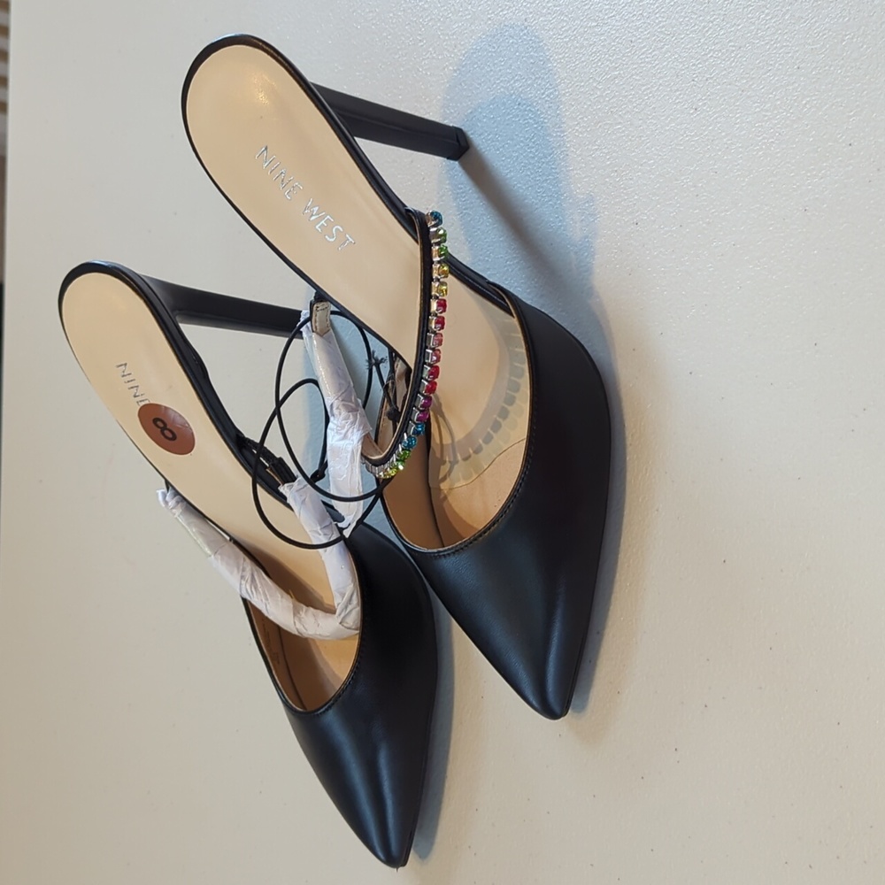 Nine West, black heel slides with rainbow rhinestone strap. 8
